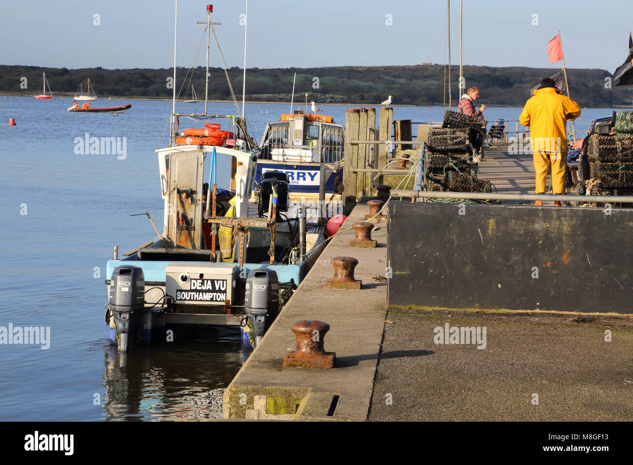 fishermen in mudeford quay on the dorset coast Stock Photo Alamy