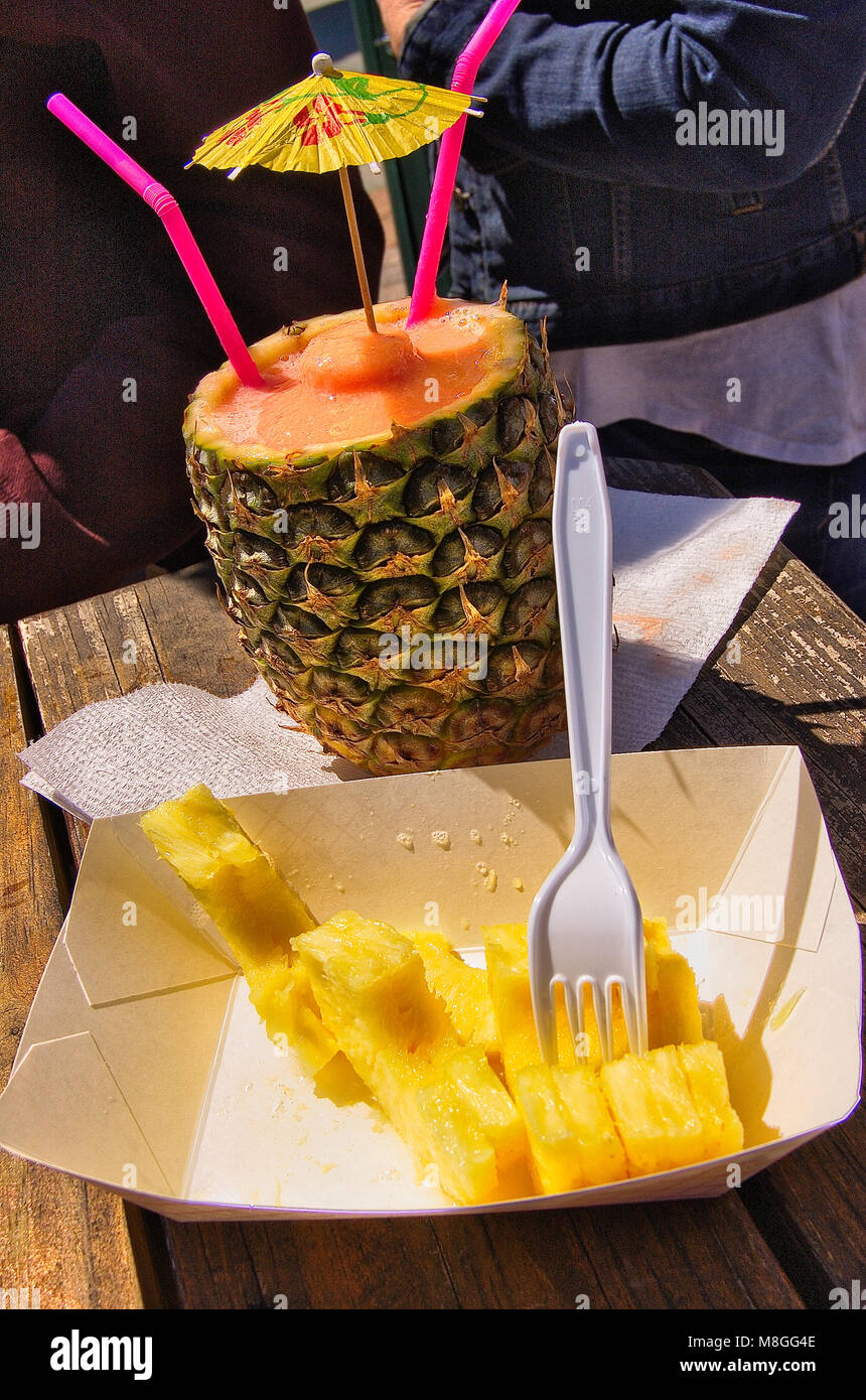 Pineapple chunks and a drink in the pineapple shell Stock Photo Alamy