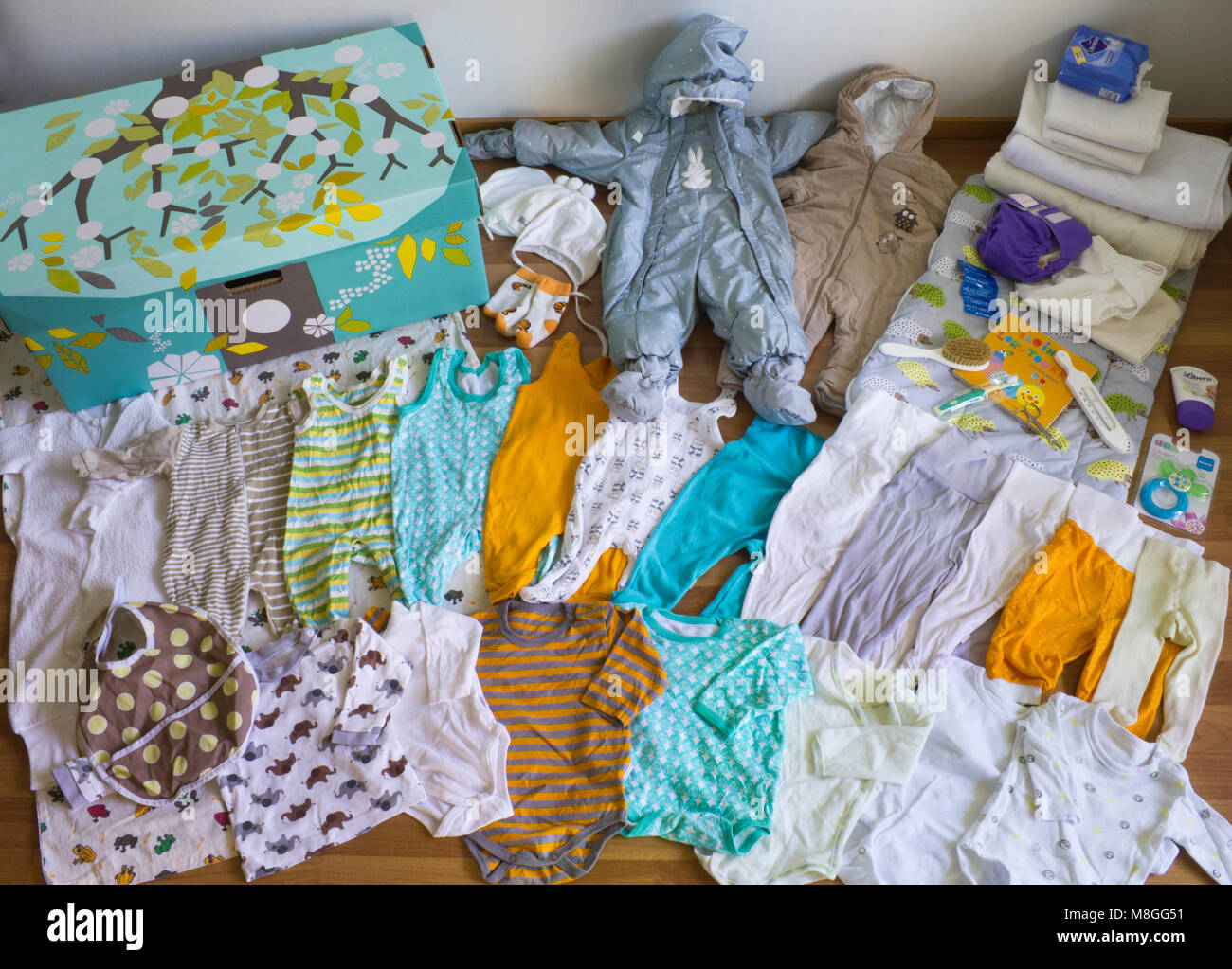 All the Finnish baby box contents spread out Stock Photo