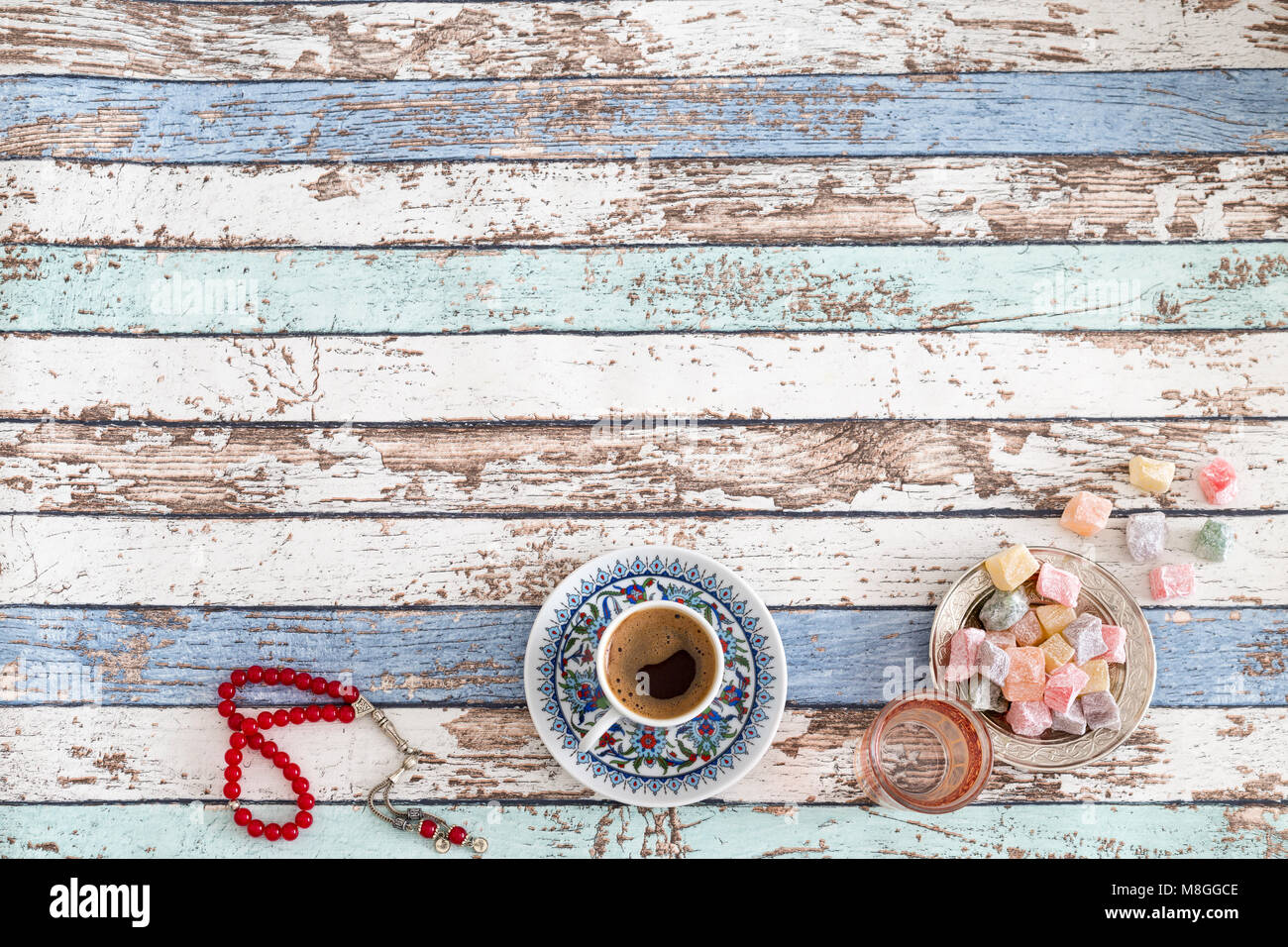Ramadan and eid background with turkish coffee, turkish delights, and red rosary Stock Photo