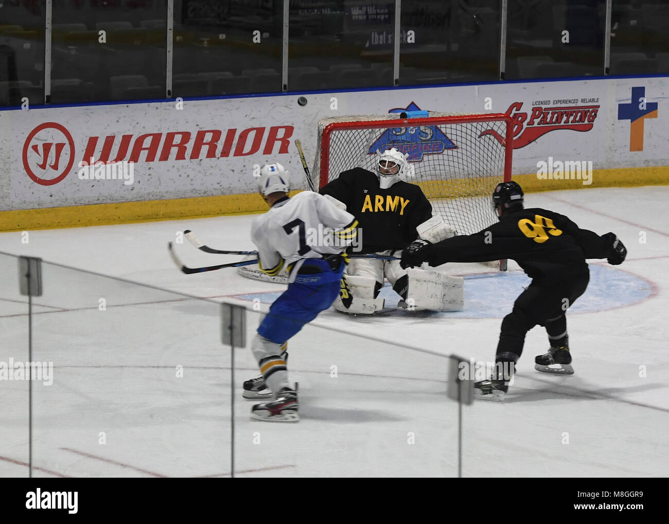 EVERETT, Wash. (March 4, 2018) Sailors assigned to the aircraft carrier USS Nimitz (CVN 68) play on an all-Navy hockey team in the Xfinity Arena against U.S. Army Soldiers, March 4, 2018.  Navy won the 3rd meeting 7-5, picking up their first win of the series. The annual game is a morale, welfare and recreation sponsored event and pits Sailors against Sailors and Marines from Navy Region Northwest. (U.S. Navy photo by Mass Communication Specialist 3rd Class Cody M. Deccio) Stock Photo