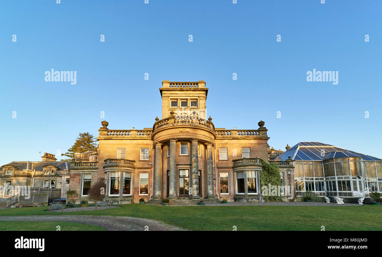 The Evening Winter light reflecting on the walls of Letham Grange manor, an  abandoned Georgian building within the grounds of Letham Grange Golf Club  Stock Photo - Alamy