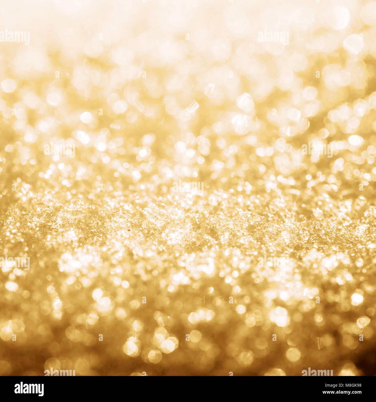Gold shine lights frozen snow bokeh Stock Photo Alamy