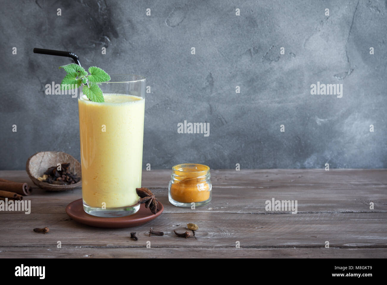 Turmeric Lassie or lassi in glass Healthy Probiotic Indian cold drink