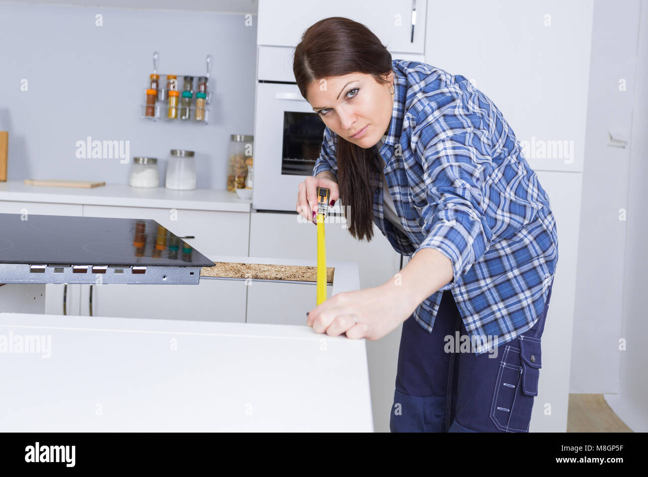 measuring to fit a hob Stock Photo Alamy