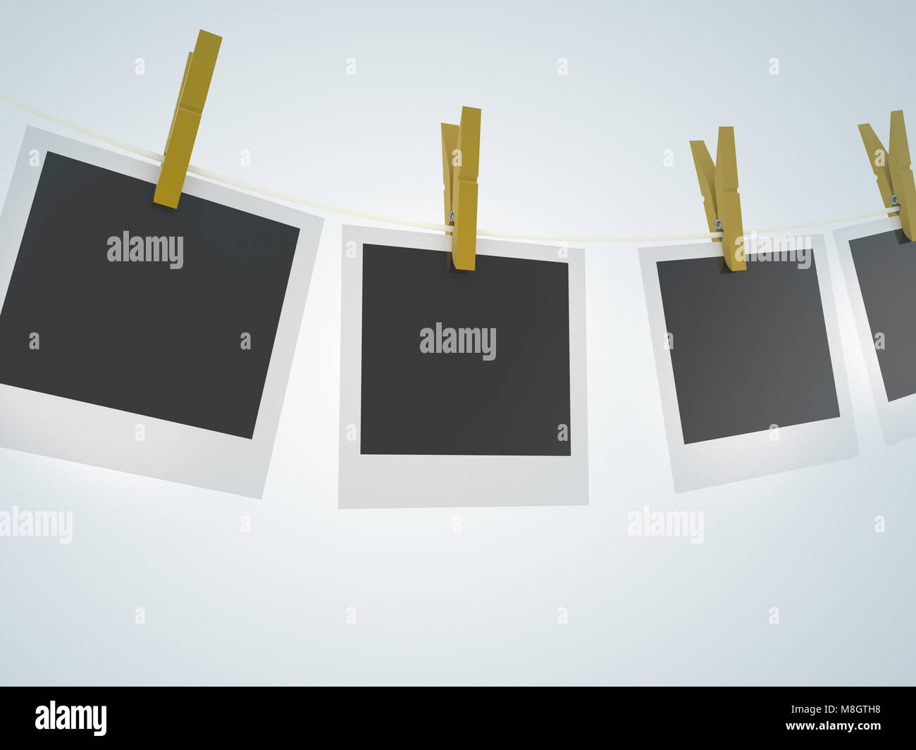 photo frames on the rope Stock Photo - Alamy