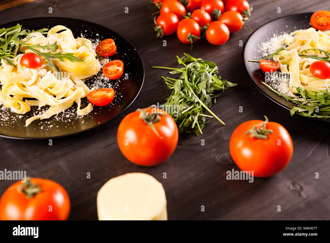 Table with healthy and delicious pasta Stock Photo - Alamy