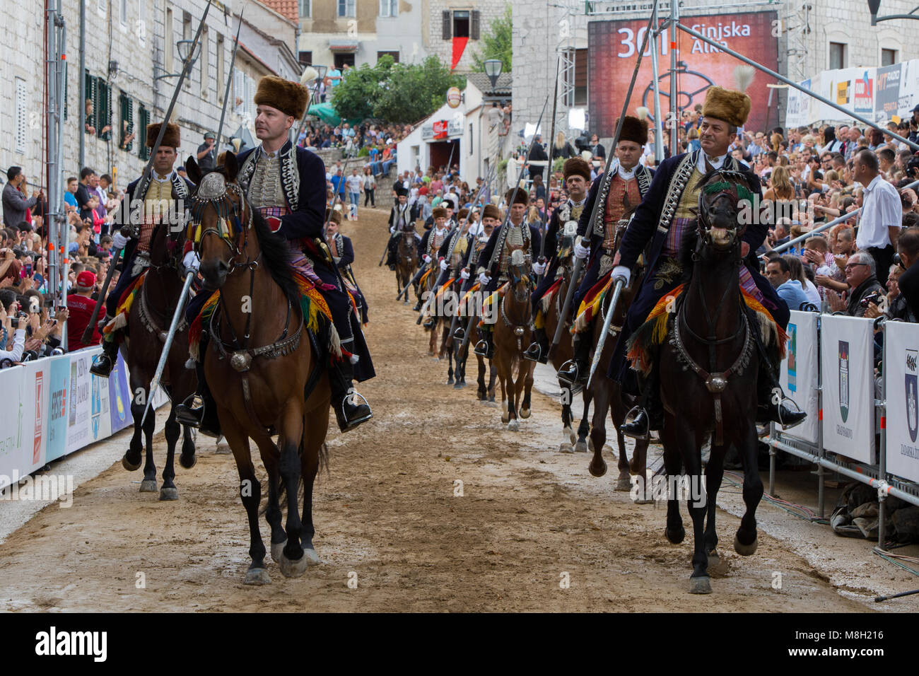 Alkars marching before Alka tournament in town Sinj, Dalmatia, Croatia Stock Photo