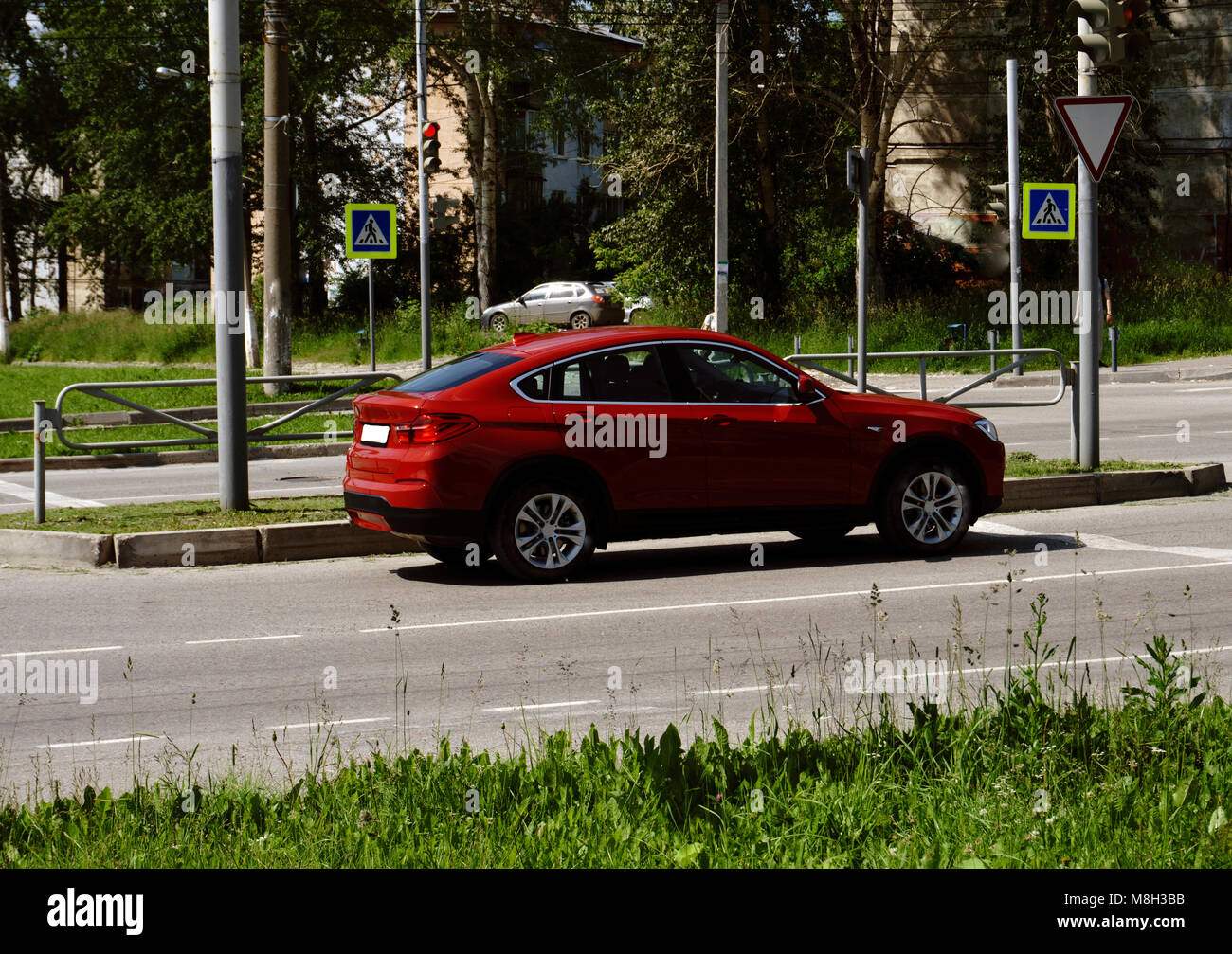 Exhaust fumes pipe during starting engine of a red car Stock Photo Alamy