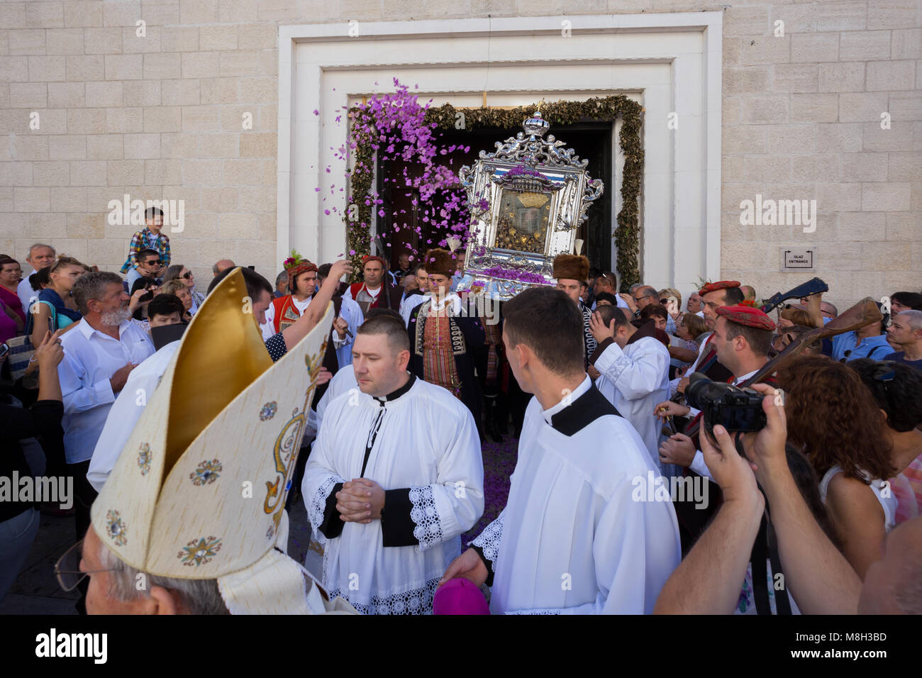 Famous painting of 'Miraculous Madonna of Sinj' is taken out on a street procession, Croatia Stock Photo