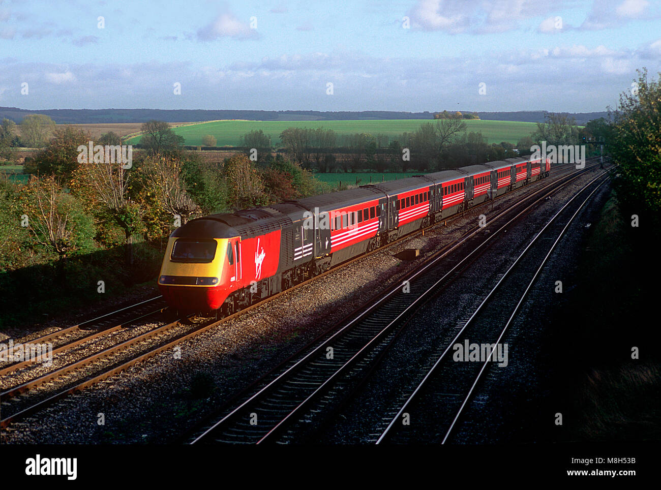 A Virgin Cross Country HST formed of power cars 43158 and 43071 at South Moreton on the Great Western Main Line on the 9th November 2001. Stock Photo