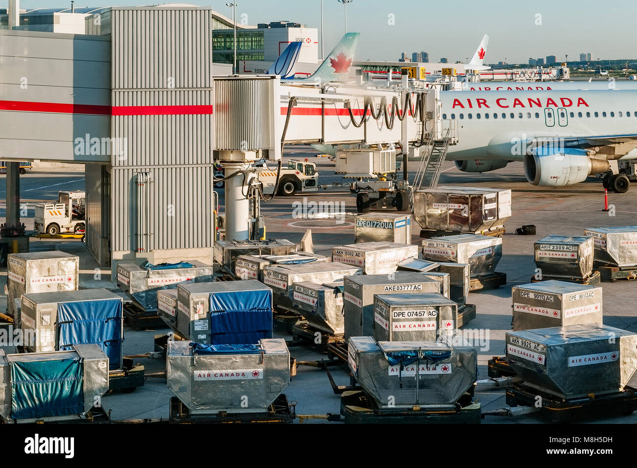 Loading planes at Vancouver International Airport, British Colombia, Canada. Stock Photo