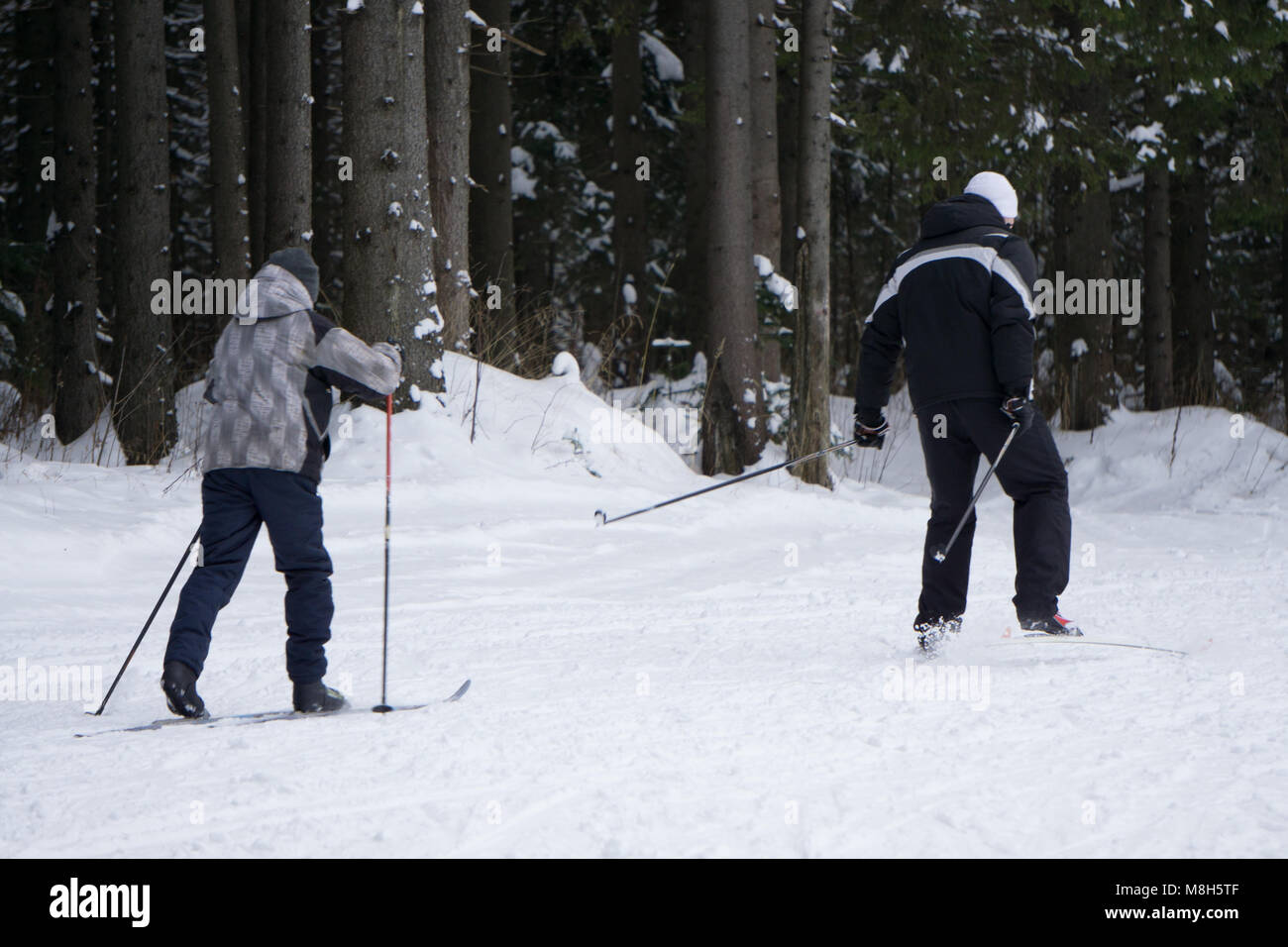Skiing, winter, ski lesson - skiers on mountainside Stock Photo