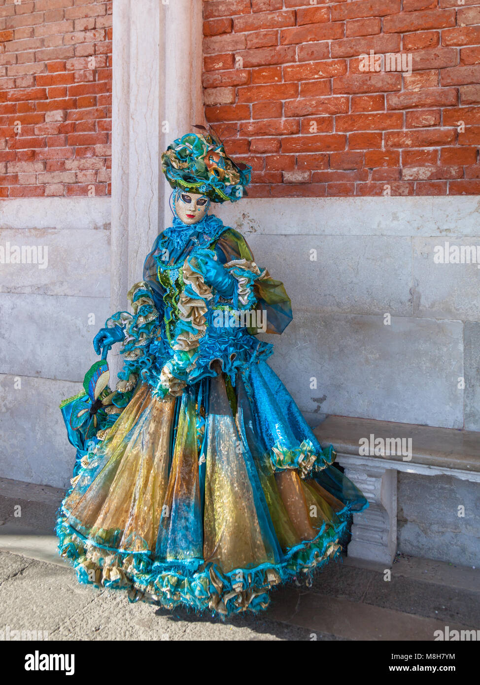 People in beautiful fancy dress costumes and mask at the Venice Carnival, Carnivale di Venezia, Veneto, Italy Stock Photo