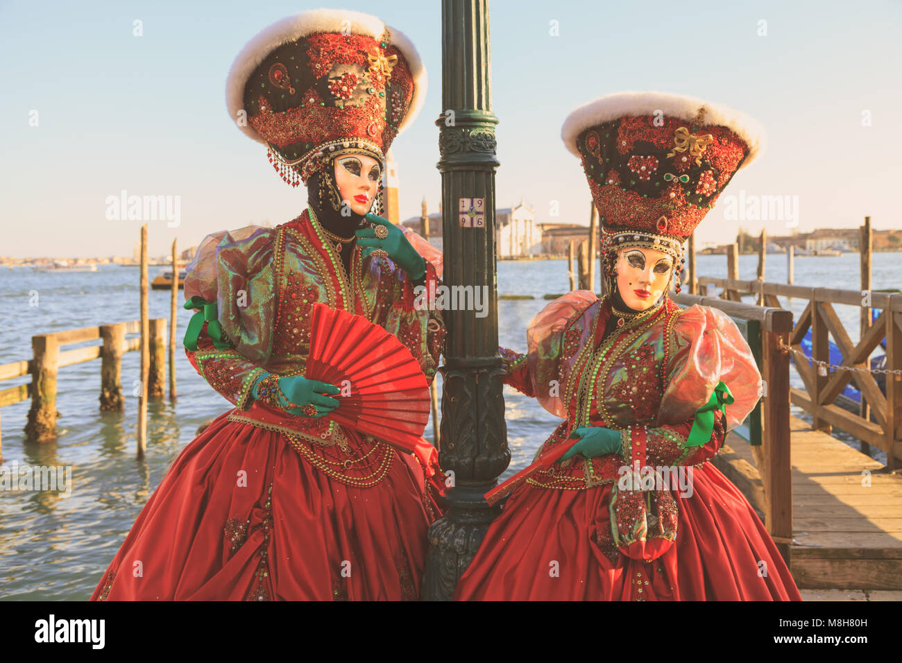 Participants in colourful arlecchino harlequin fortune teller costume and  mythical oriental outfit pose, Carnevale Di Venezia, Venice Carnival, Italy  Stock Photo - Alamy