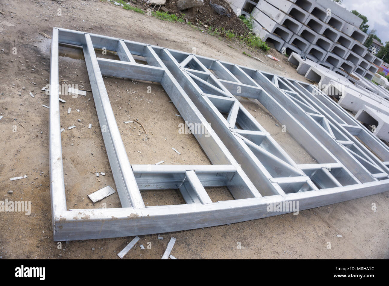 New residential construction home metal framing against a blue sky Stock Photo