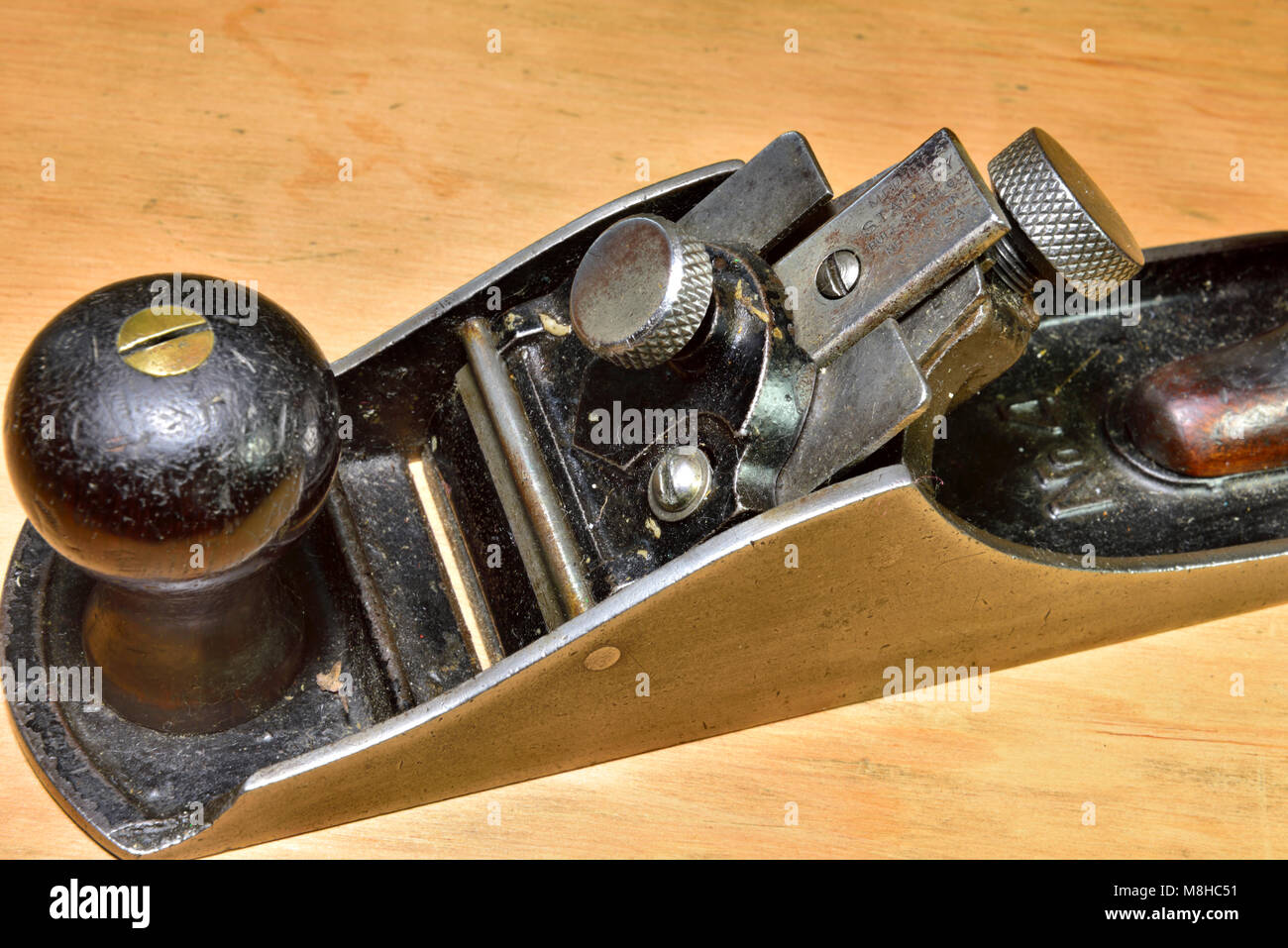 Close up blade of Gage smoothing plane, made by Stanley Company after taking over the Gage Tool company from 1920 to 1941. Gage Self-Setting Wood Plan Stock Photo