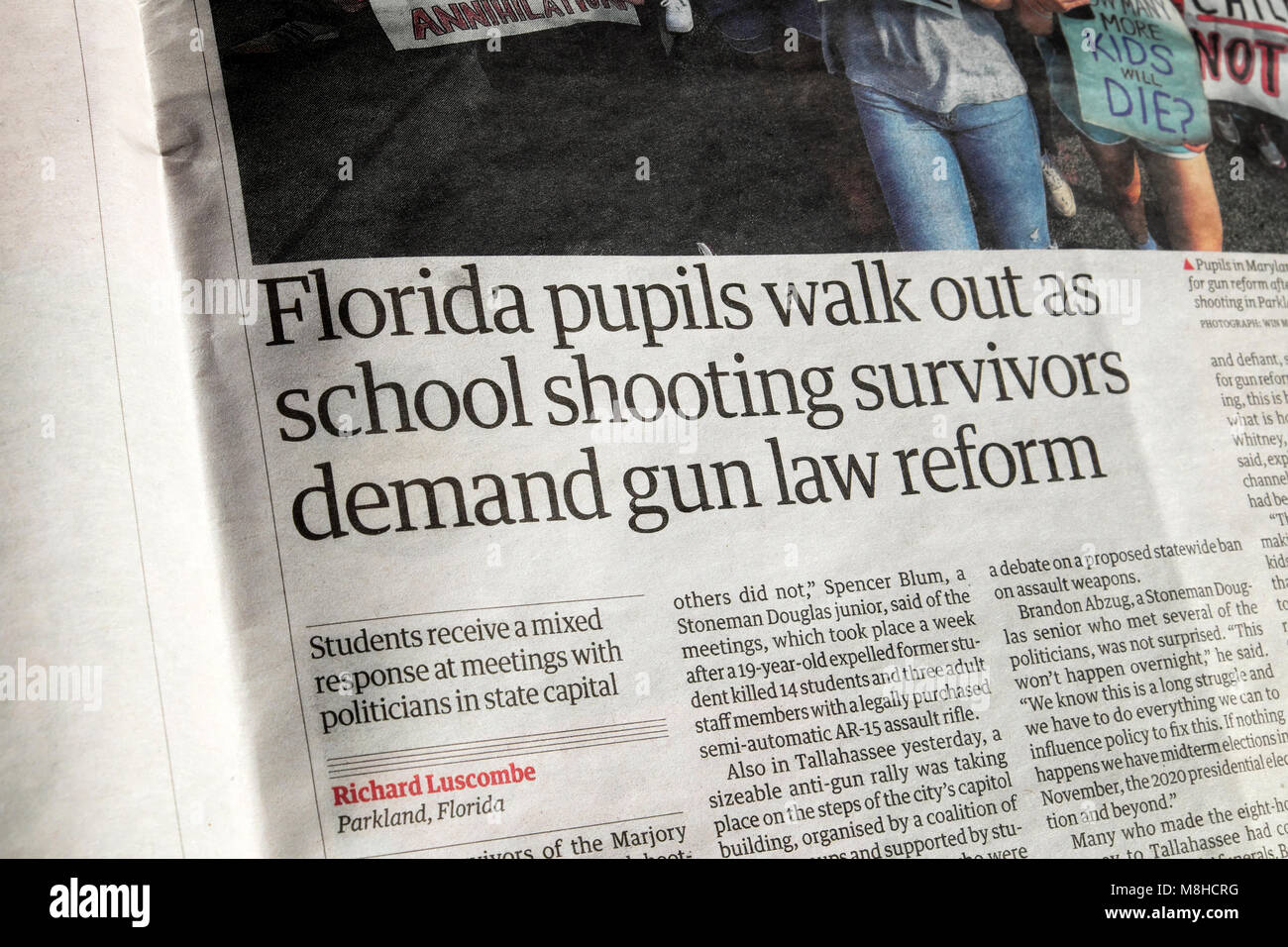 Guardian newspaper article  'Florida pupils walk out as school shooting survivors demand gun law reform' 2018  in London England UK Stock Photo
