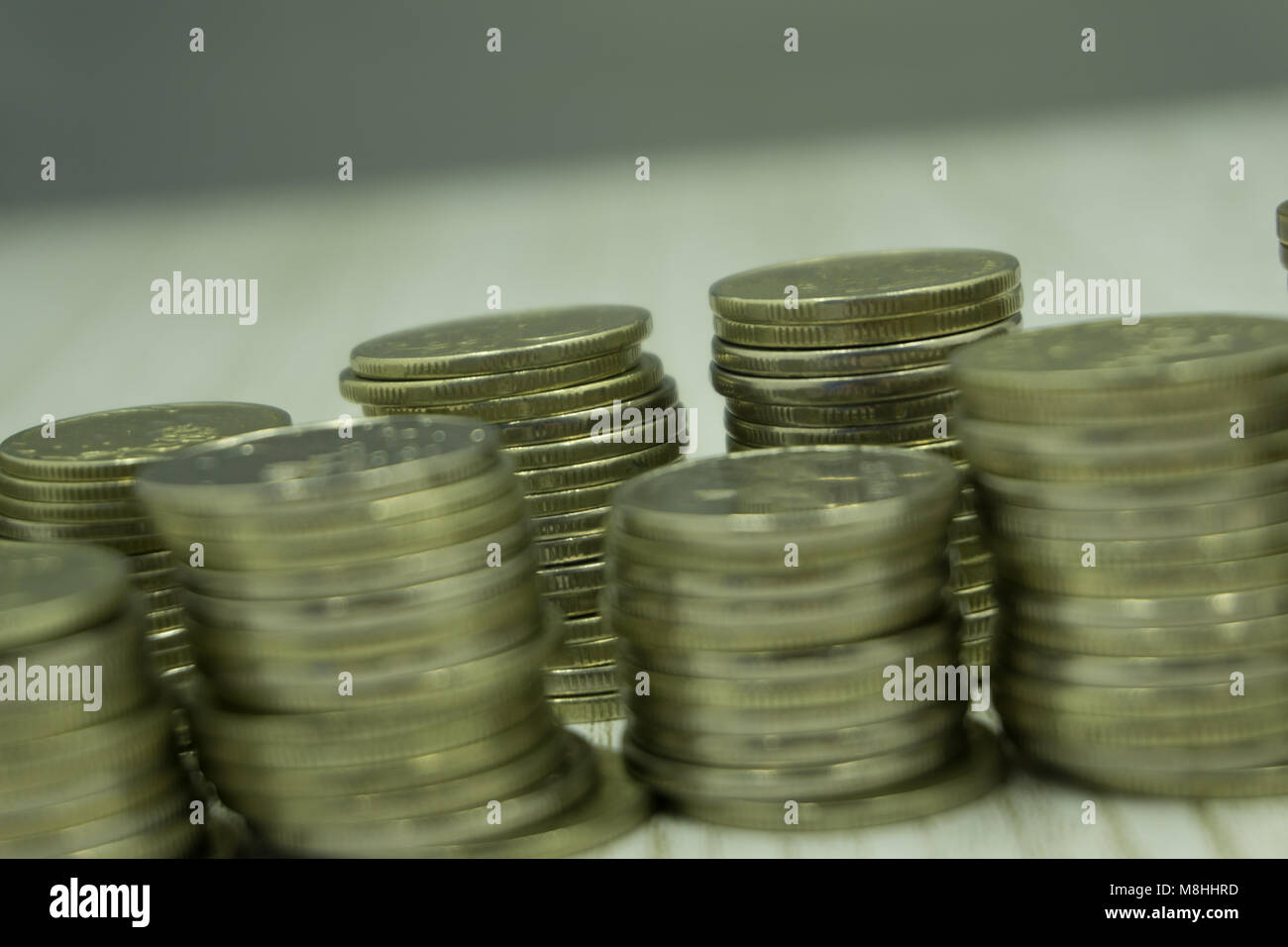 gold coin stack isolated on white Stock Photo - Alamy