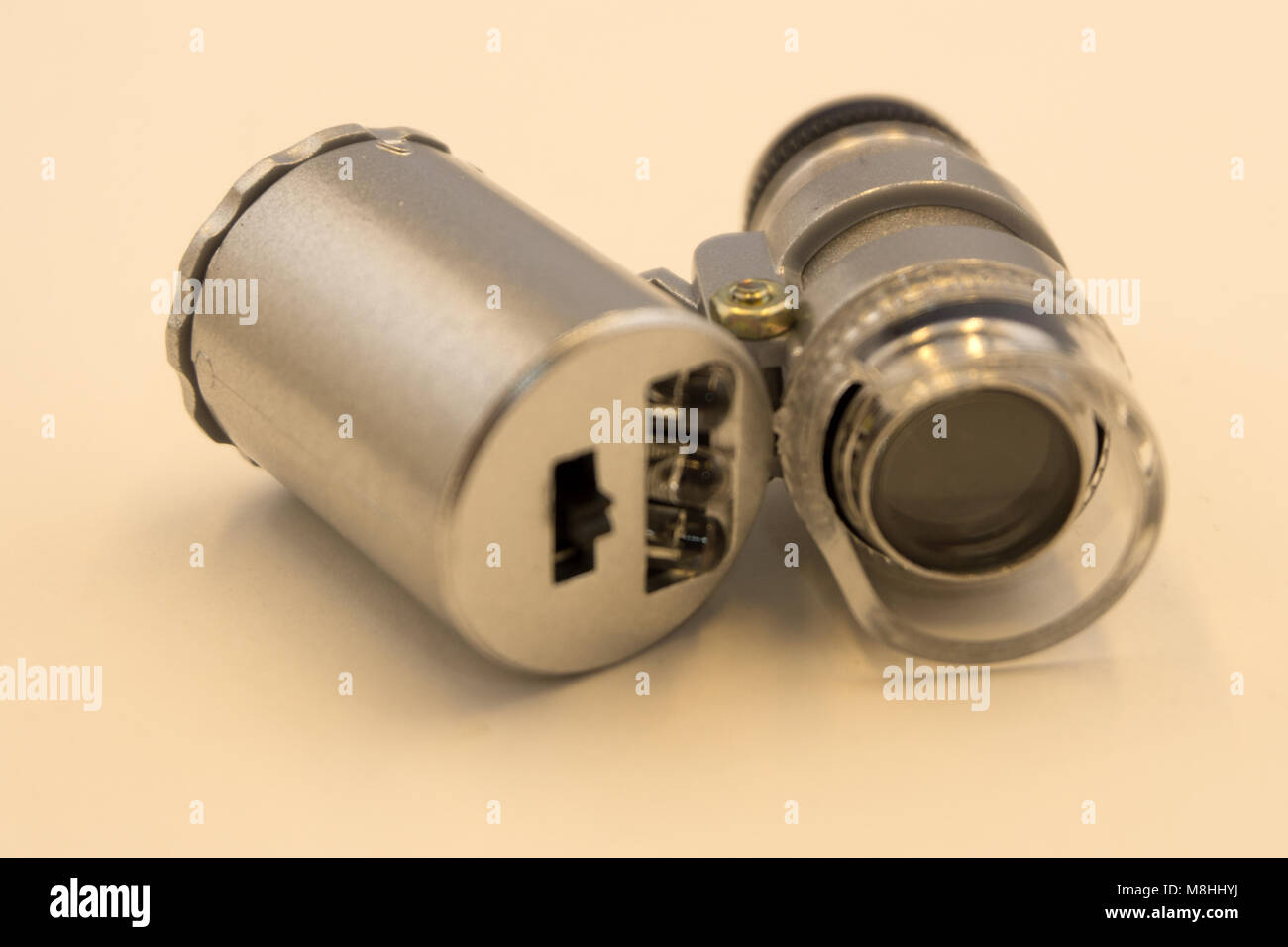 Pocket watch being repaired by senior watch maker, closeup Stock Photo