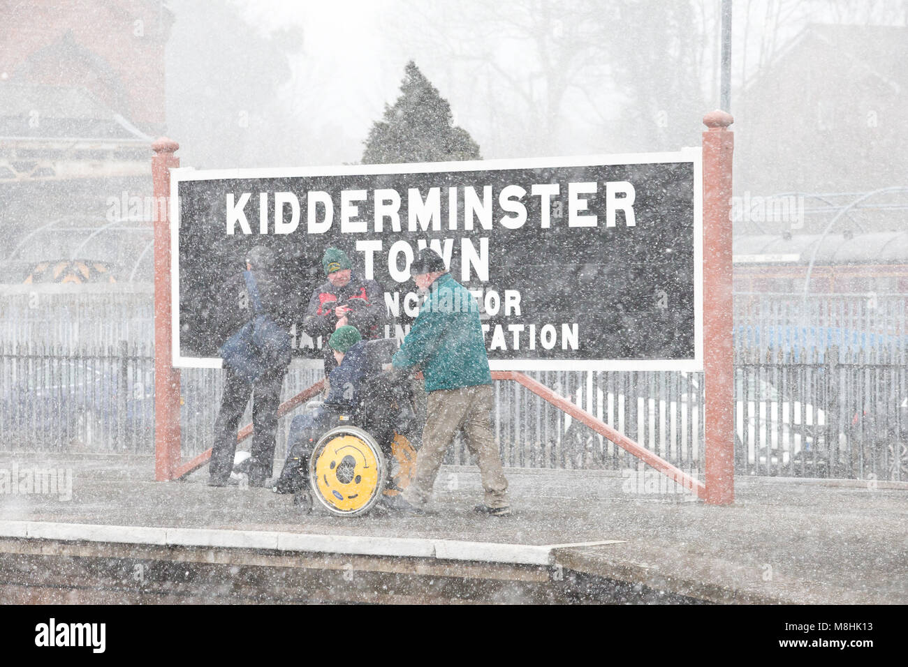 Kidderminster, UK. 17th March, 2018. UK weather: as the Severn Valley Railway celebrates a successful 'Spring Gala Weekend', train enthusiasts of experience blizzard conditions throughout the day. Despite strong, bitterly cold, easterly winds leading to a significant wind chill, nothing stops the railway enthusiasts from enjoying their trainspotting passion. Credit: Lee Hudson/Alamy live News Stock Photo