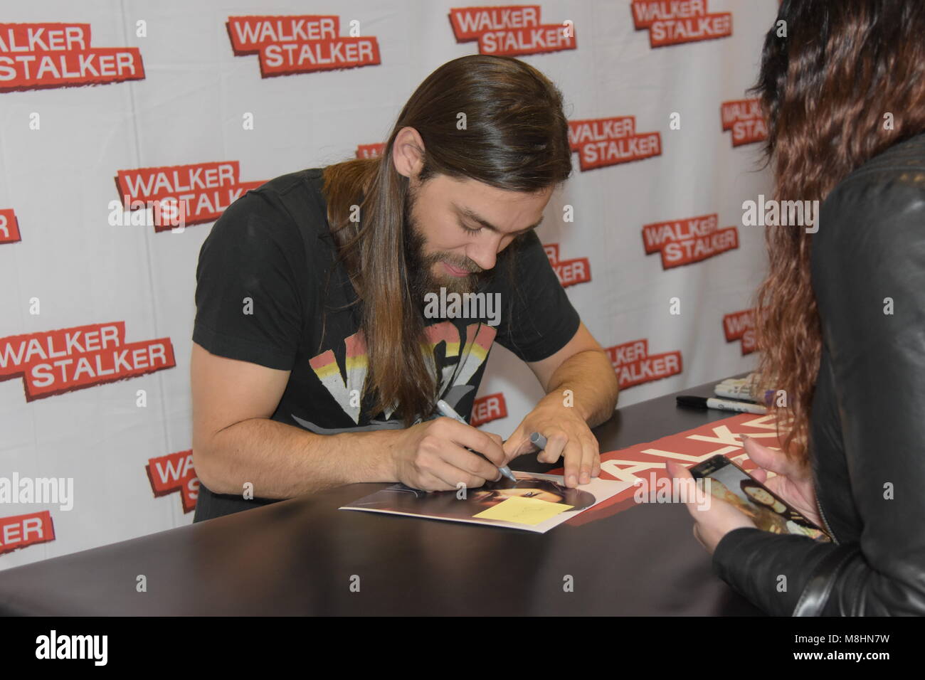 MANNHEIM, GERMANY - MARCH 17: Actor Tom Payne (Jesus on The Walking Dead) at the Walker Stalker Germany convention. (Photo by Markus Wissmann) Stock Photo