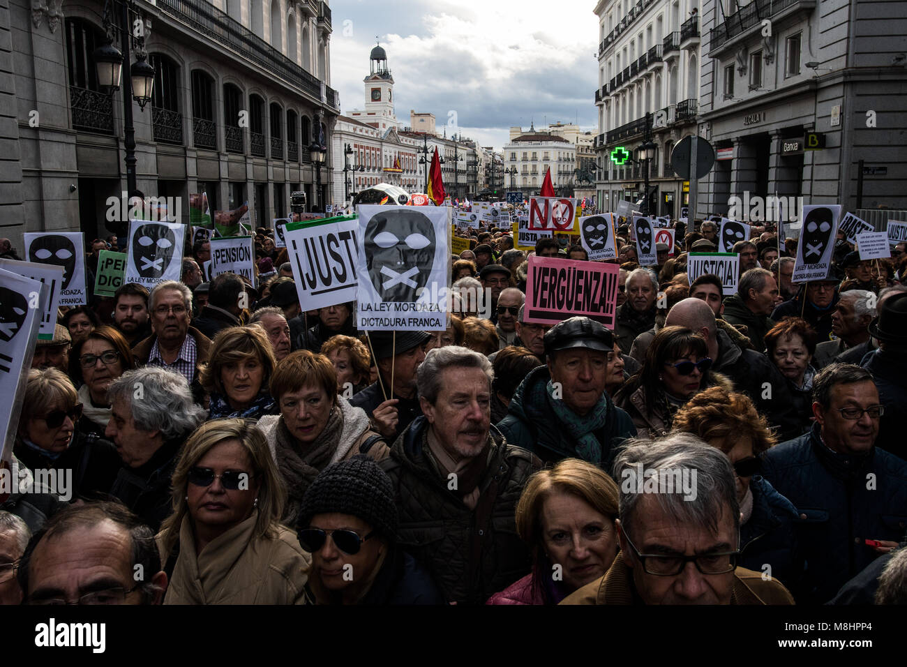 Madrid, Spain. 17th March, 2018. People protesting against Citizen Security Law also known as 'Gag Law', demanding freedom of expression. Retirees have joined the demonstration to also demand better pensions, in Madrid Spain. Credit: Marcos del Mazo/Alamy Live News Stock Photo