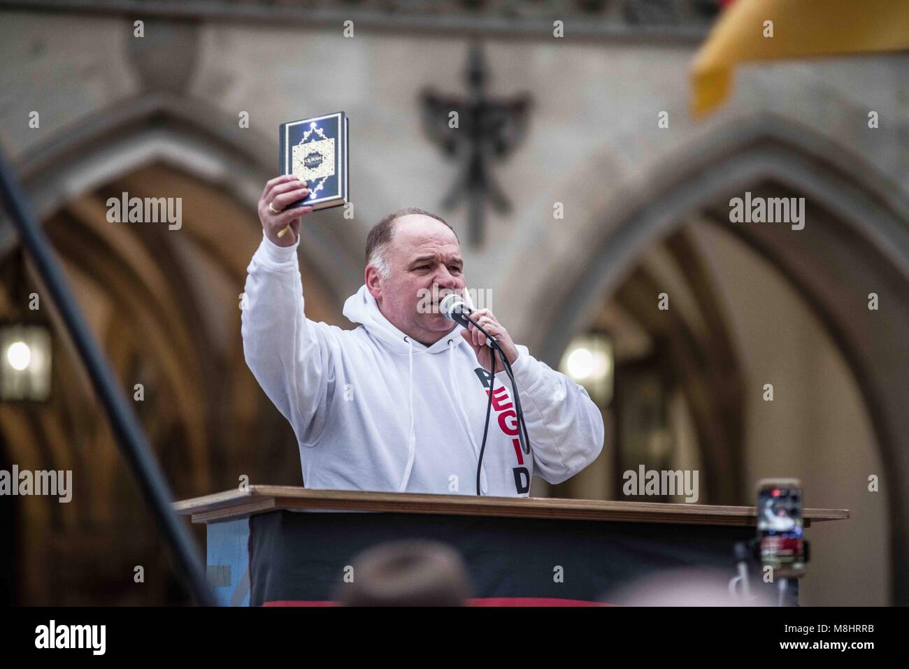 Munich, Bavaria, Germany. 17th Mar, 2018. Gernot Tegetmeyer of Pegida Nuremburg. Lutz Bachmann and Michael Stürzenberger (Sturzenberger) Lutz Bachmann and Sigfried Daebritz, founders of the PEGIDA extreme-right movement appeared in Munich alongside Michael Stürzenberger (Sturzenberger) amid numerous protests from various organizations, politicians, and celebrities. The Munich branch, in exchange, appeared in Dresden. Munich has a storied history with Pegida, with the current branch under monitoring from the Bavarian secret service (Verfassungsschutz) and being called "the weaponized ar Stock Photo