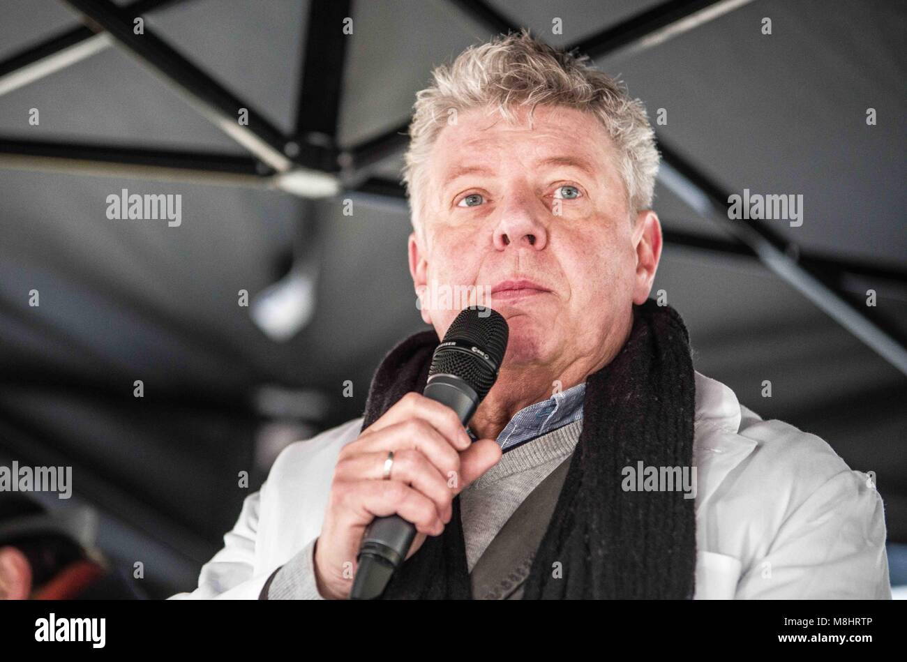 Munich, Bavaria, Germany. 17th Mar, 2018. Munich mayor Dieter Reiter. Protesting against the arrival of Pegida Dresden's Lutz Bachmann and Sigfried Daebritz in Munich, no less than three demonstrations were organized by the city, including a Muenchen ist Bunt and Bellevue di Monaco protest at Max Joseph Platz. At this demonstration, choirs were in attendance, along with celebrities, politicians, and other prominent Muenchners dressed as doctors in order to tell Pegida that they will help them go back to Dresden. Participants: Syrischer Friedenschor, MÃ¼nchner Kneipenchor, Der Chor der Sc Stock Photo
