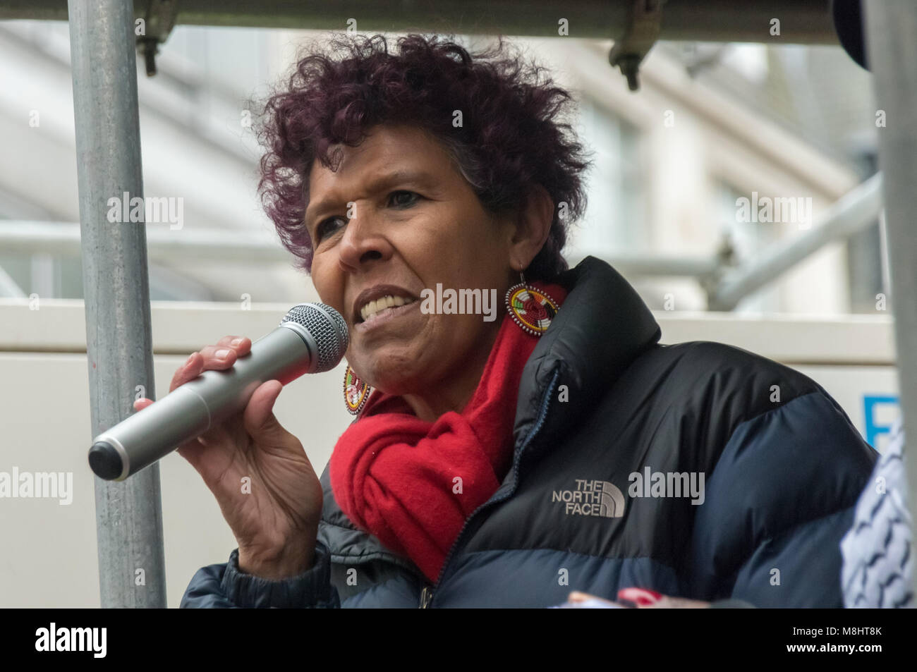 London, UK. 17th March 2018. Moyra Samuels of Justice4Grenfell speaks at the rally outside the BBC before the March against Racism on UN Anti Racism Day. Peter Marshall/Alamy Live News Stock Photo