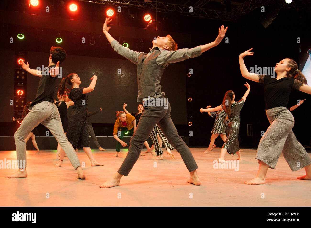 Move It 2018. Dancers from ENBYouthCo perform on the main stage. Move It, the country's biggest dance event, takes place at ExCeL, London, UK. Running 16th-18th March 2018, the event is drawing large crowds of dance enthusiasts and students, with trade stands, workshops, showcases, and stunning performances by leading performing arts academies and dance groups taking place on the main stage throughout each day. 17th March 2018. Credit: Antony Nettle/Alamy Live News Stock Photo
