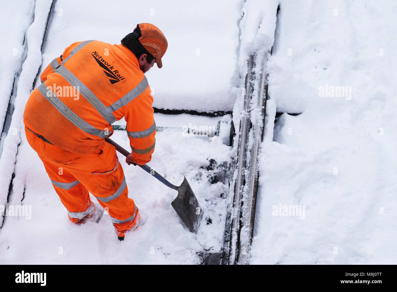 Network Rail Rail Maintenance Staff Clear Snow From Rail Tracks And Ice From Points At Hereford 