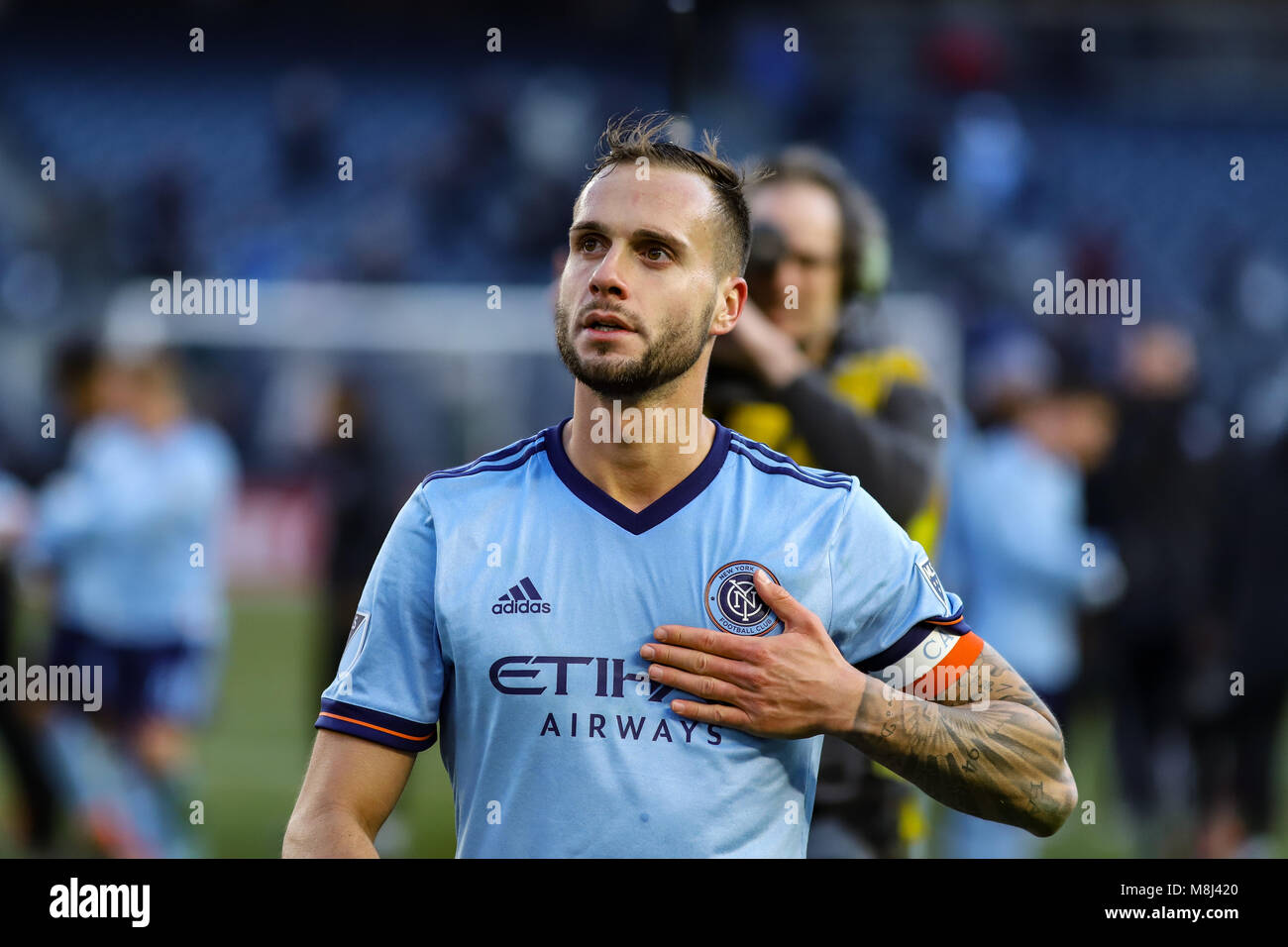 NYCFC vs. Orlando City SC action at Yankee Stadium on 17th March 2018. NYCFC won 2-0. Maxime Chanot (4) thanks the fans after the game. Stock Photo