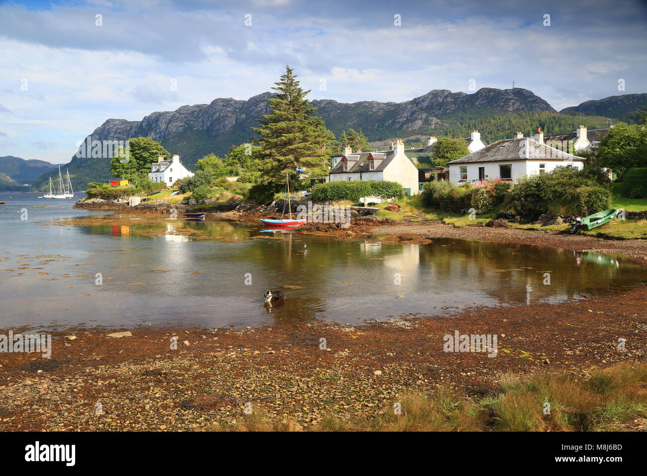 Plockton is a small pretty village, which sits on a sheltered bay with stunning views overlooking Loch Carron, in the Highlands of Scotland. Stock Photo