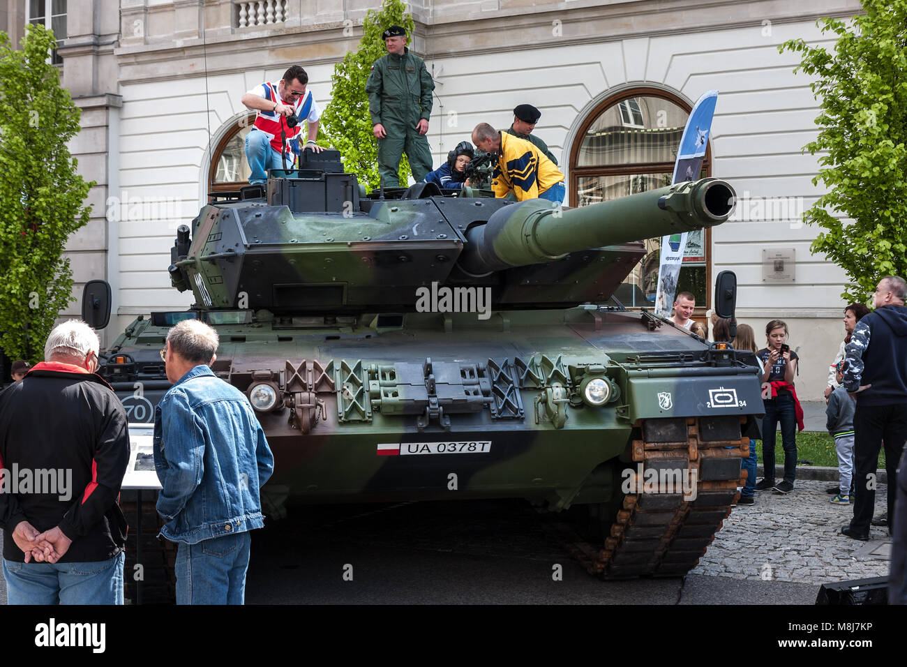 WARSAW, POLAND - MAY 08, 2015: Leopard 2 tank, improved 2A5 version. People curiously looking and learning during the public celebrations of 70th Anni Stock Photo