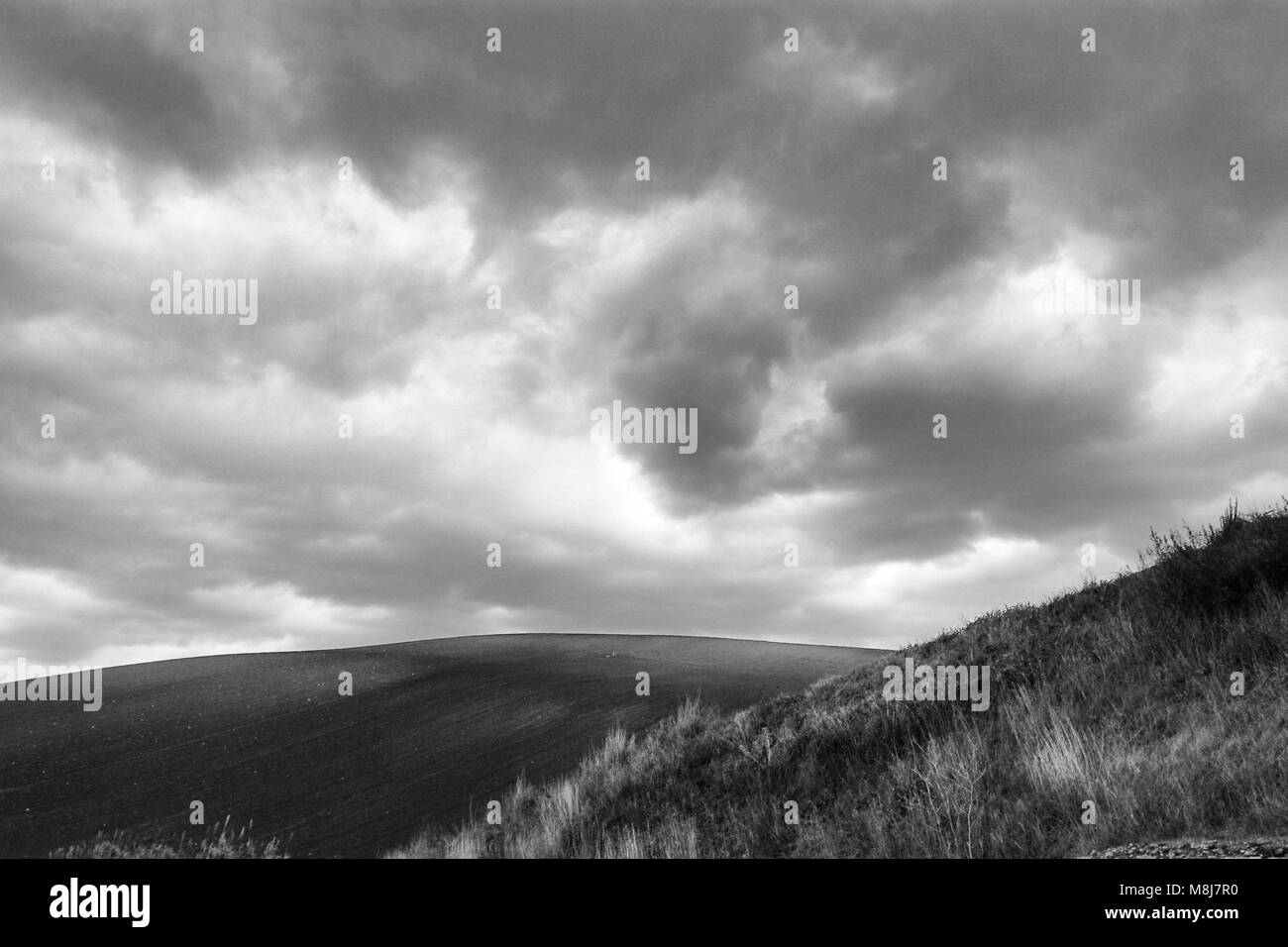 Lonely Art Nature Hills field under cloudy sky stormy weather black and ...