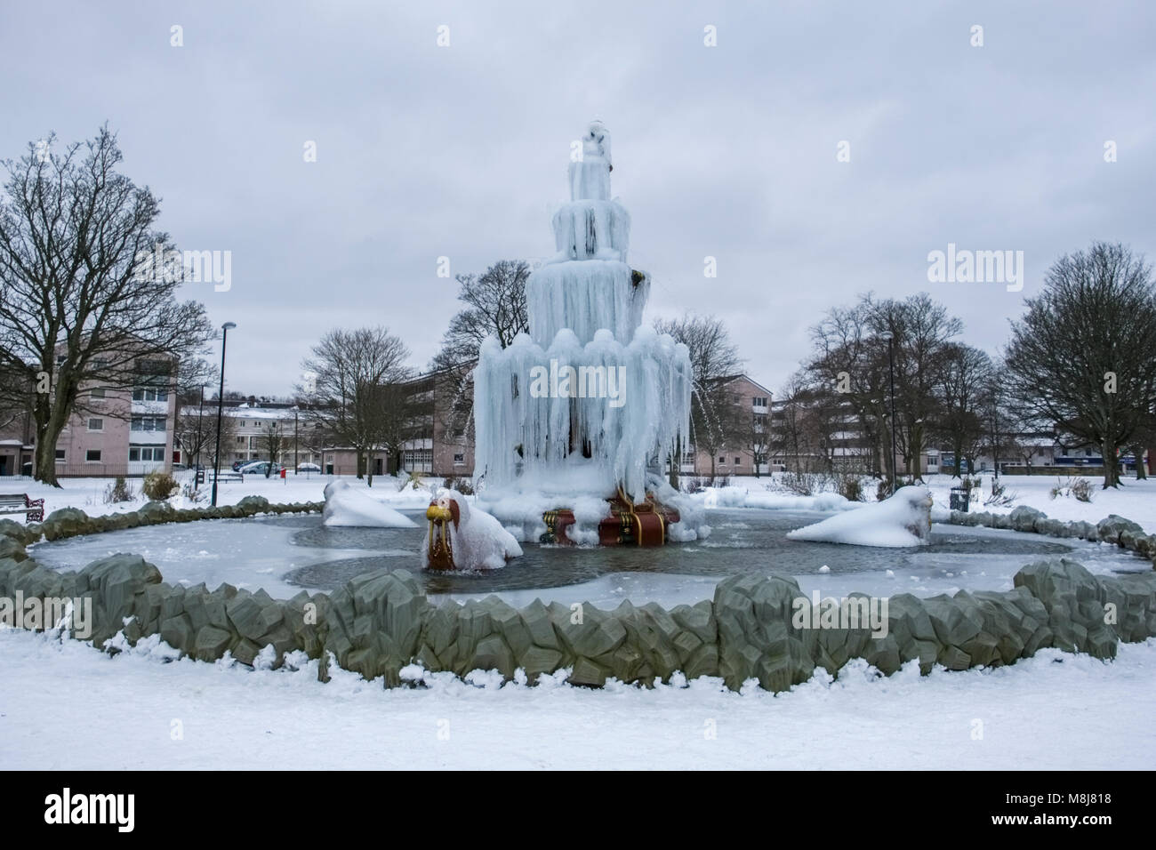 Frozen fountain at Fountain Park, Paisley, Scotland during ‘Beast from the East’ bad weather system. Stock Photo