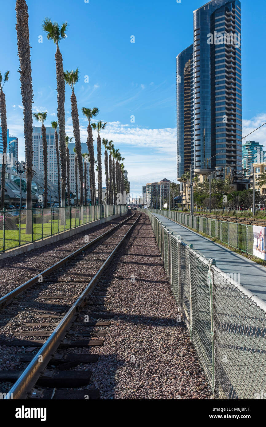 SAN DIEGO, CALIFORNIA, USA - Metropolitan Transit System red trolley line in the Gaslamp Quarter of Downtown San Diego. Stock Photo