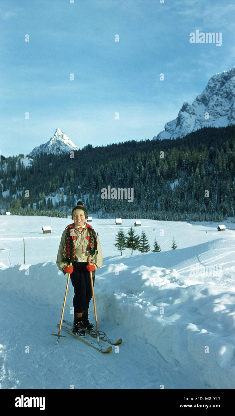 old time ski images, young skier from the 1950's, Italian Alps with Matterhorn far away. Accurate scan from color slide Stock Photo