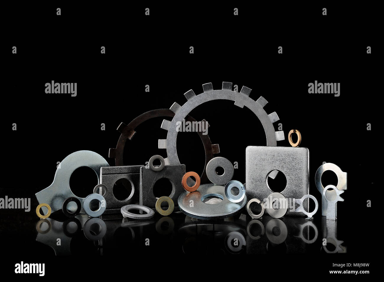 Set of many types of lock washers on black background Stock Photo Alamy