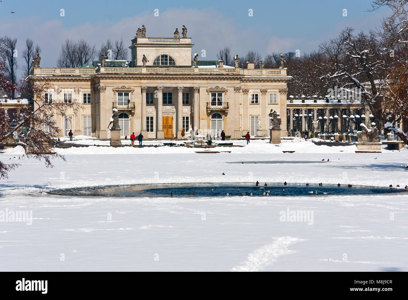 Palace on the Water in Winter time in Lazienki Park area (Royal Baths Park), the major tourist attraction. WARSAW CITY, POLAND - MARCH 15, 2010 Stock Photo