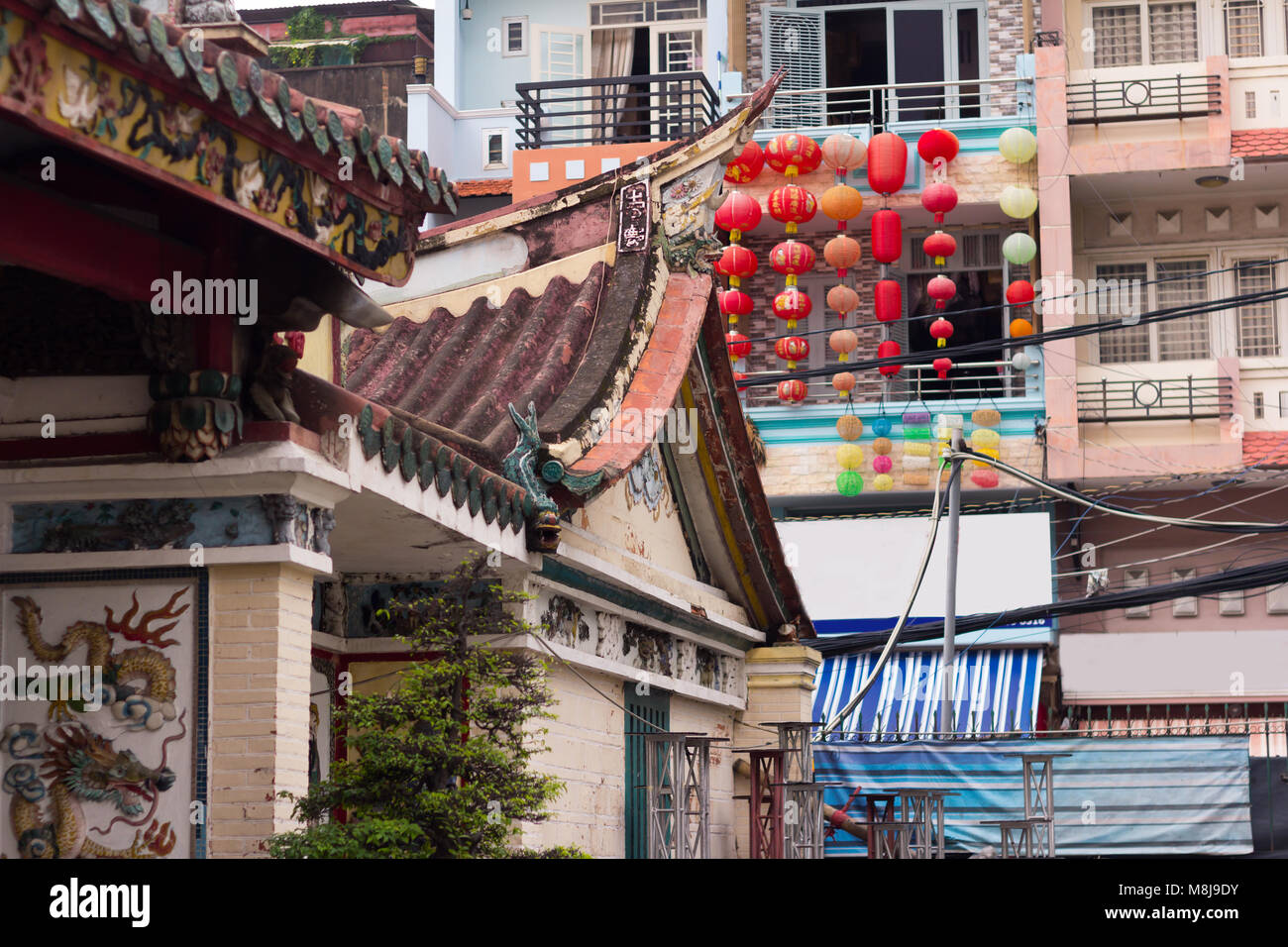 roof of old chinese temple in modern city Stock Photo