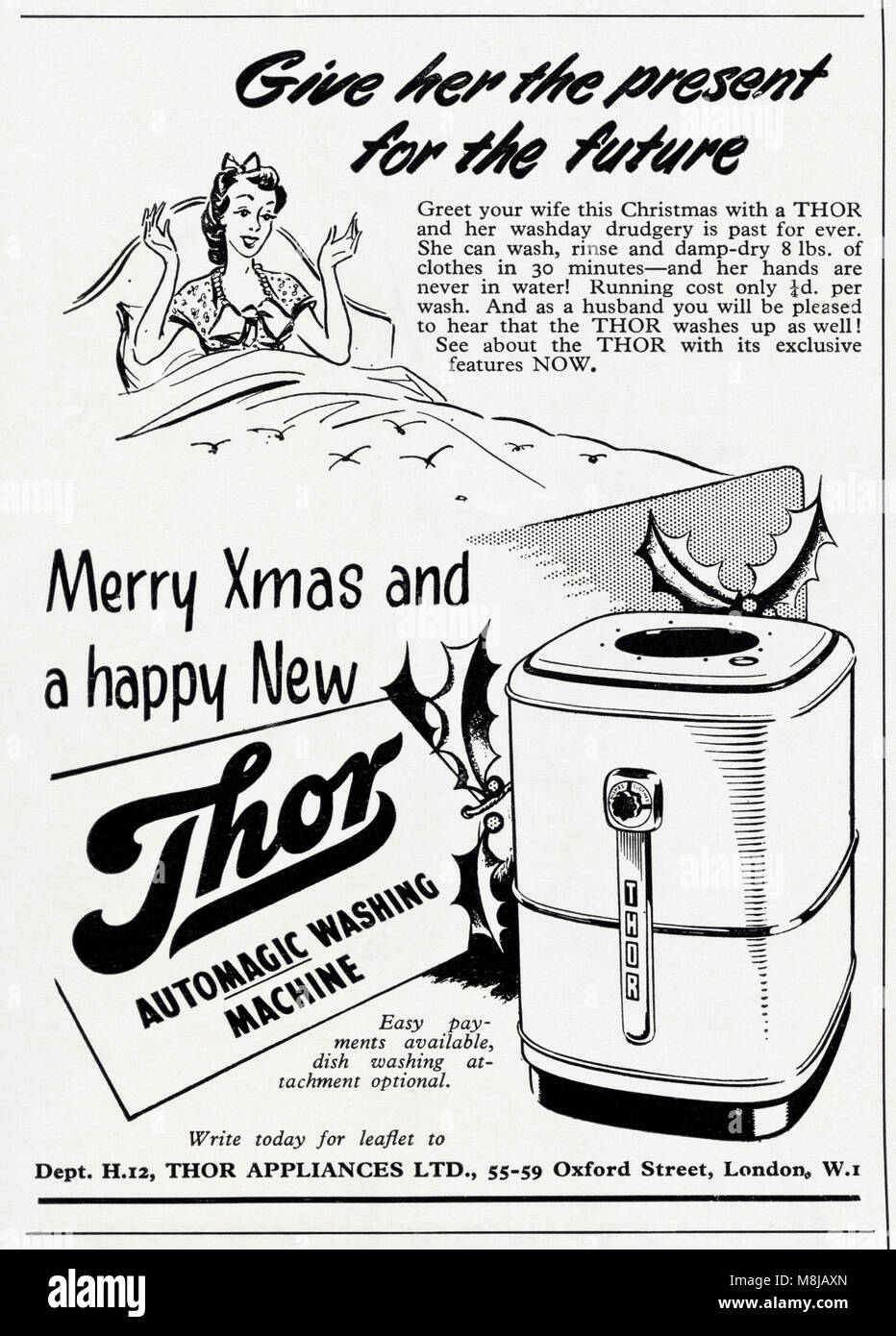 1950s original old vintage advertisement advertising Thor washing machine as a present for your wife for Christmas in English magazine circa 1950 Stock Photo
