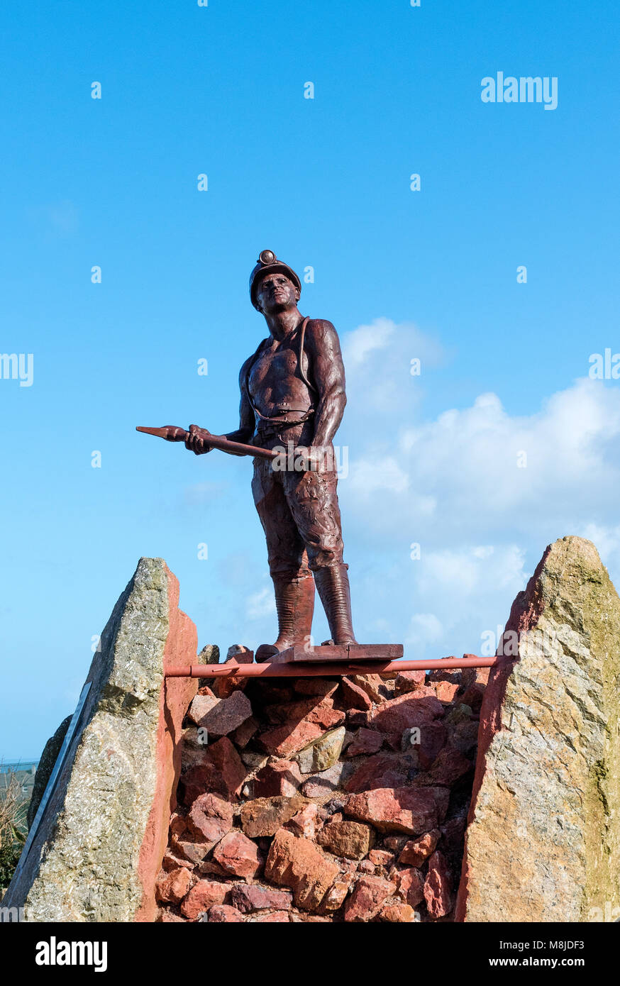 a statue of a cornish tin miner by sculptor colin caffell  in the memorial garden at the old geevor tin mine in pendeen, cornwall, england, britain, u Stock Photo