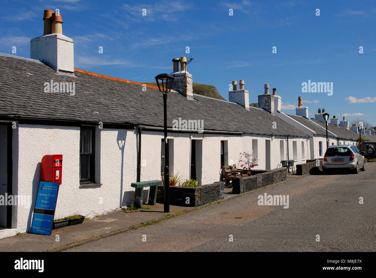 Row of former slate-miners cottages, Ellenabeich, Seil Island, Scotland Stock Photo
