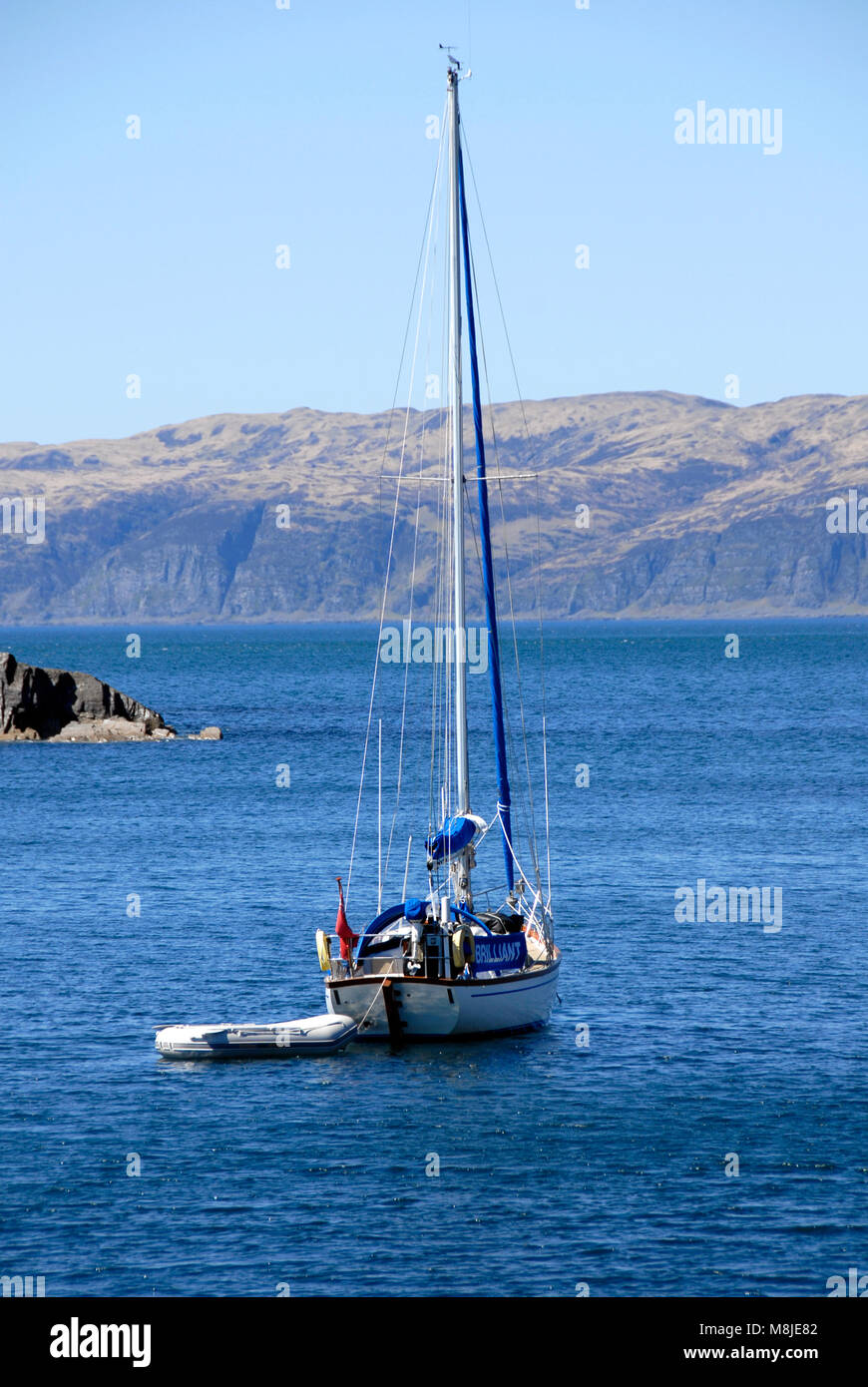 Single moored yacht, Seil Island, Scotland Stock Photo
