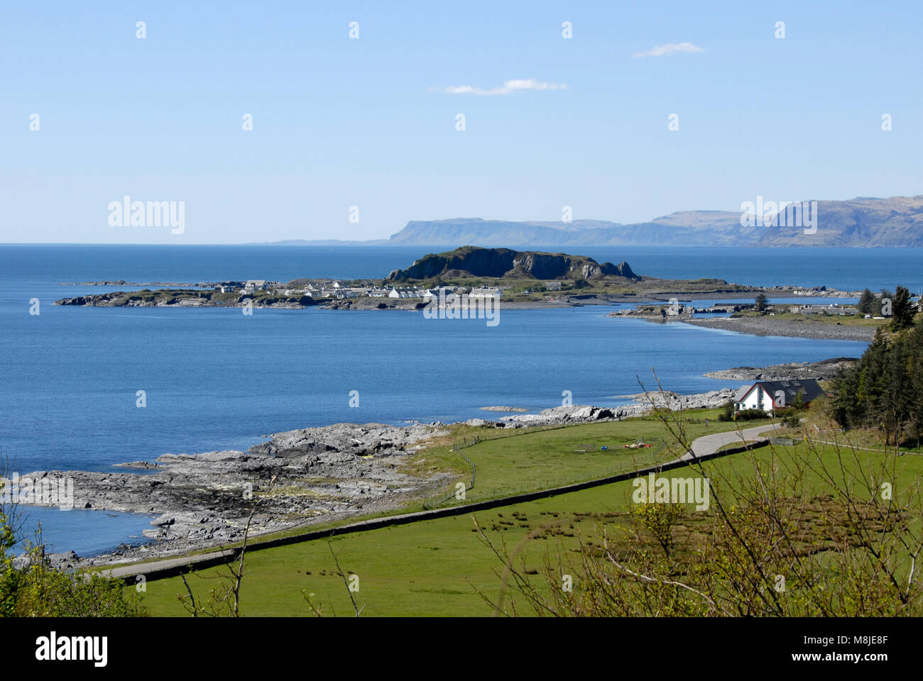 Distant view of Ellenabeich, Seil Island, West coast, Scotland Stock Photo