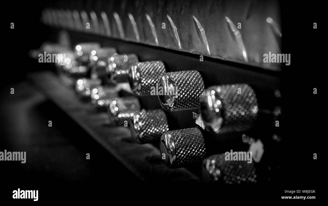 Bold black & white close up of an electric guitar valve amp head Stock Photo