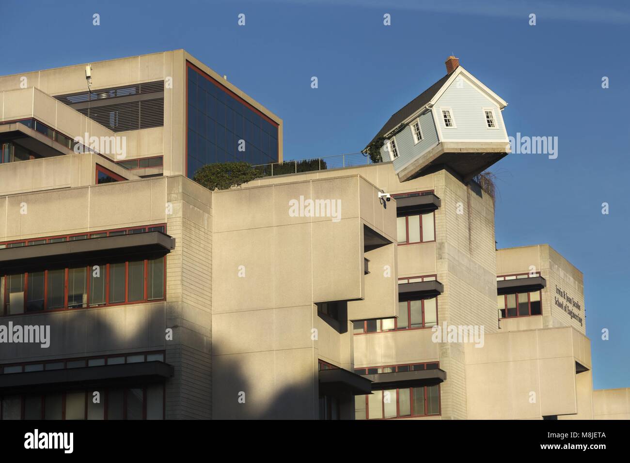 Fallen Star, an artwork by Do Ho Suh, a skewed house on top of Jacobs School of Science and Engineering at University of California San Diego UCSD Stock Photo