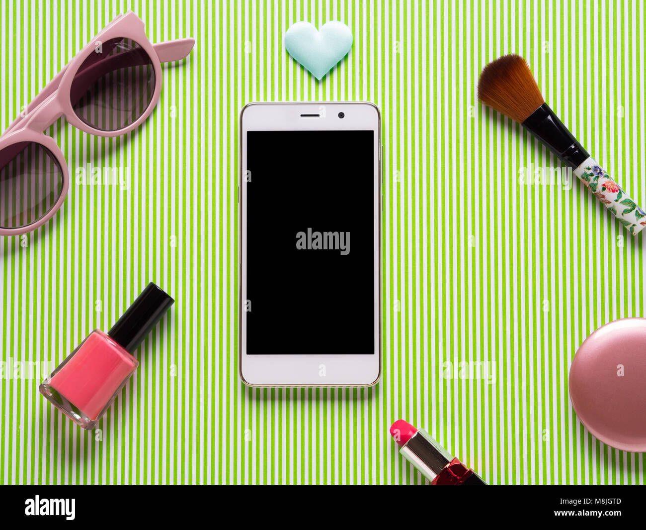 Smartphone black screen and make up girl's accessories flat lay Stock ...